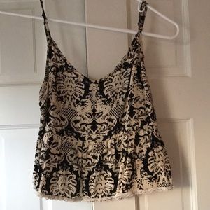 Off white and black crop top with peplum and lace